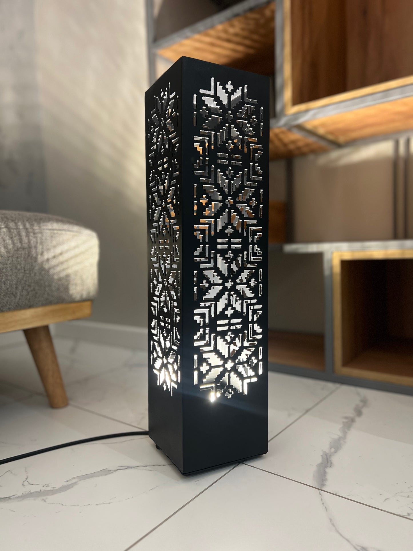tall modern floor lamp with multicolor LED lighting in minimalist bedroom interior