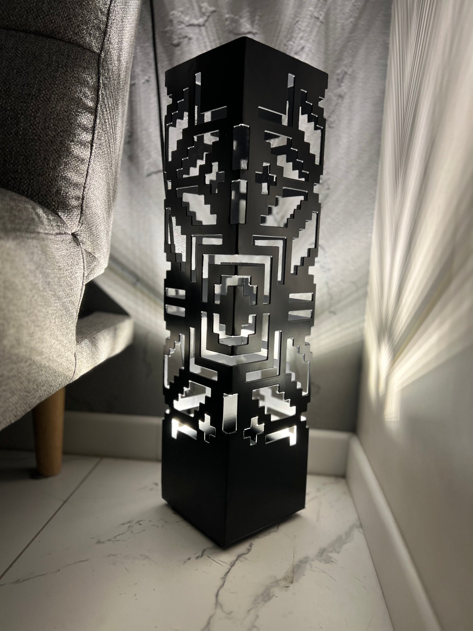 unique housewarming gift metal floor lamp with artistic laser cut design and LED light