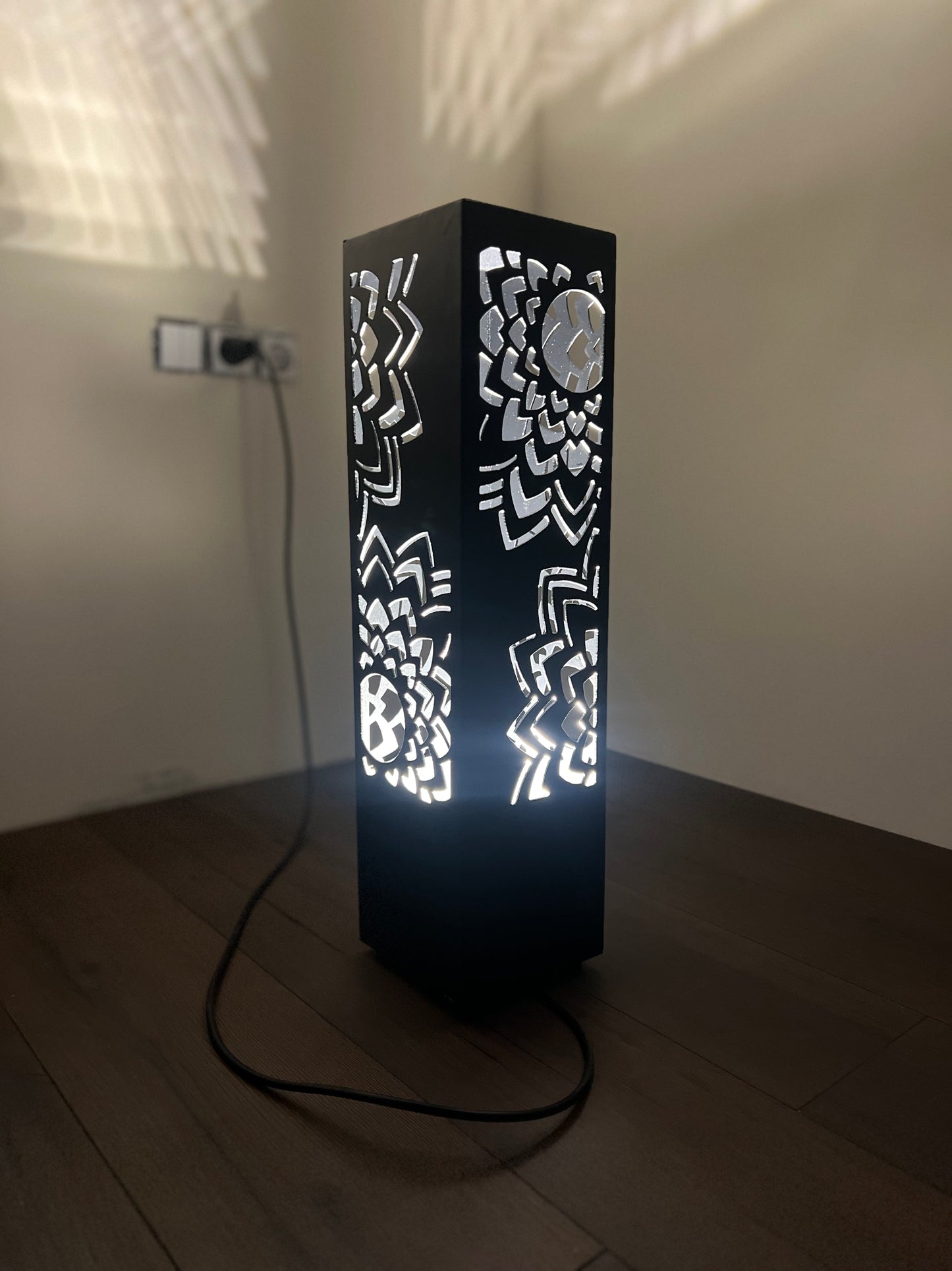 metal floor lamp RGB LED with laser cut geometric pattern and soft ambient glow