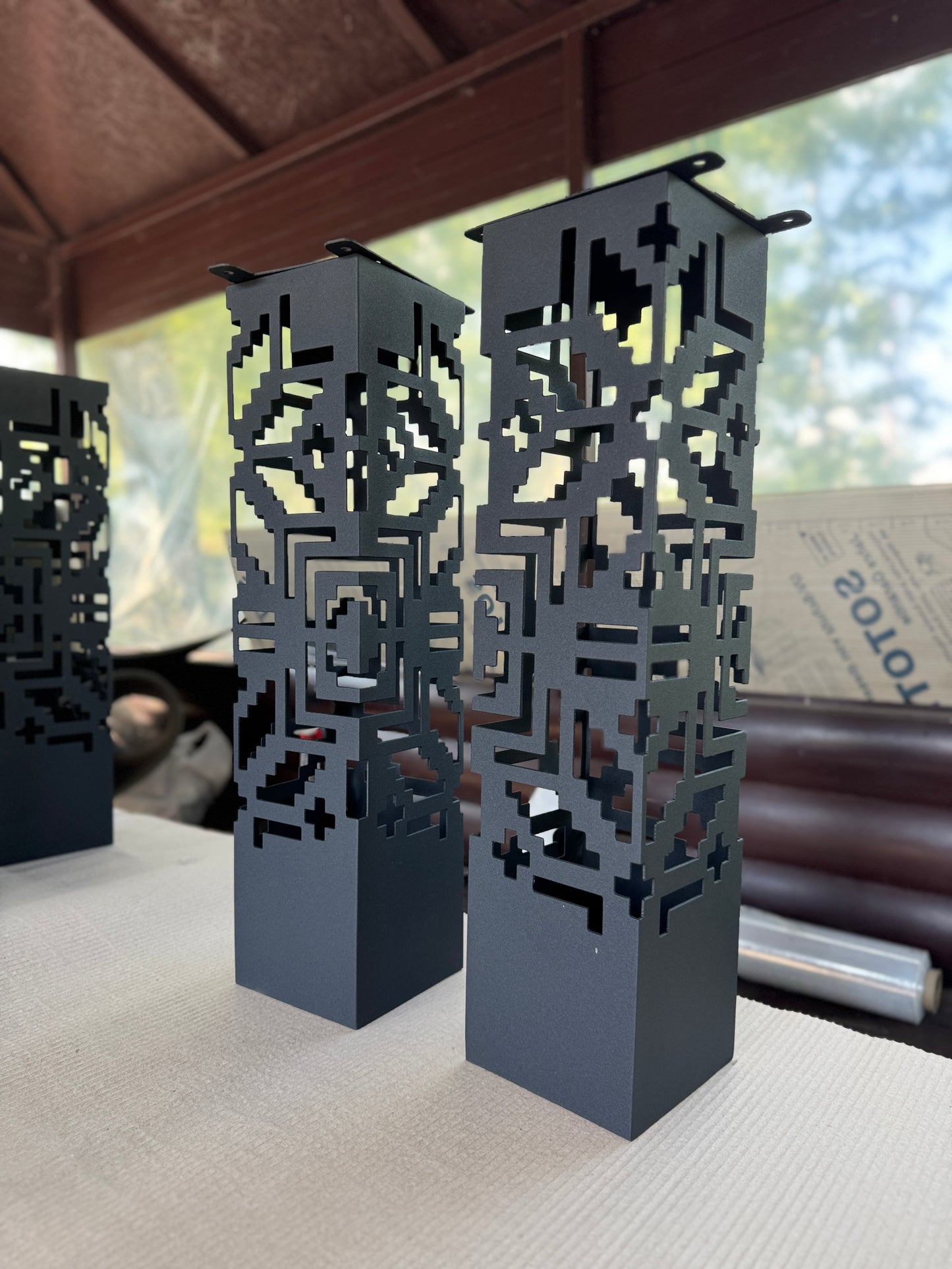 modern metal garden sculpture lamp with ambient LED lighting
