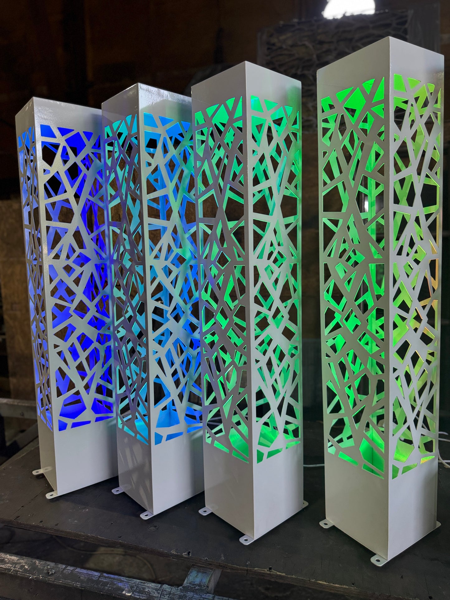 modern LED outdoor column light with laser cut geometric design