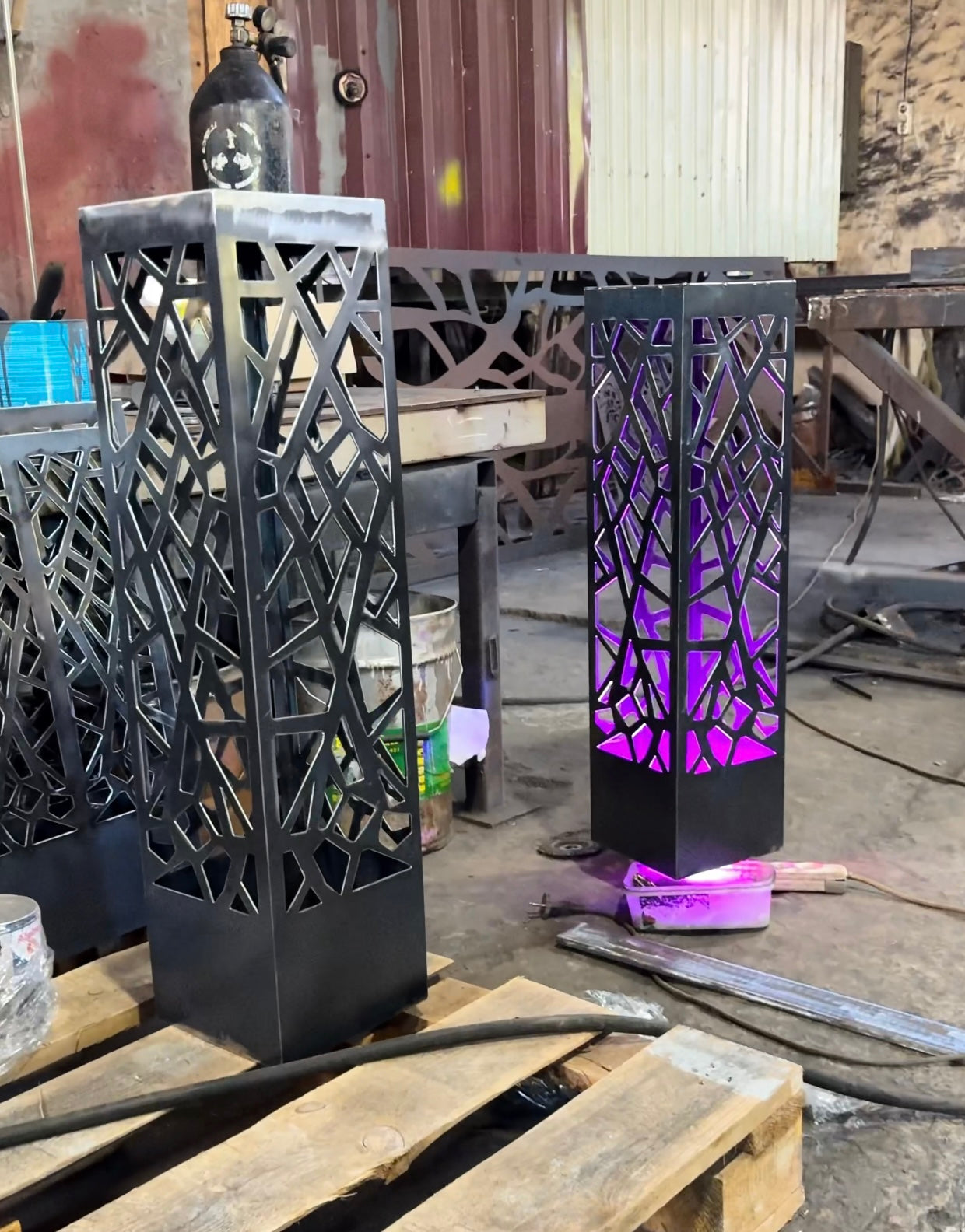 laser cut metal garden column lamp with ambient LED illumination