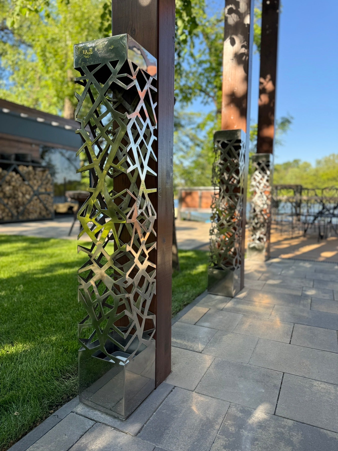 stainless steel LED column lamp with reflective surface and clean modern design