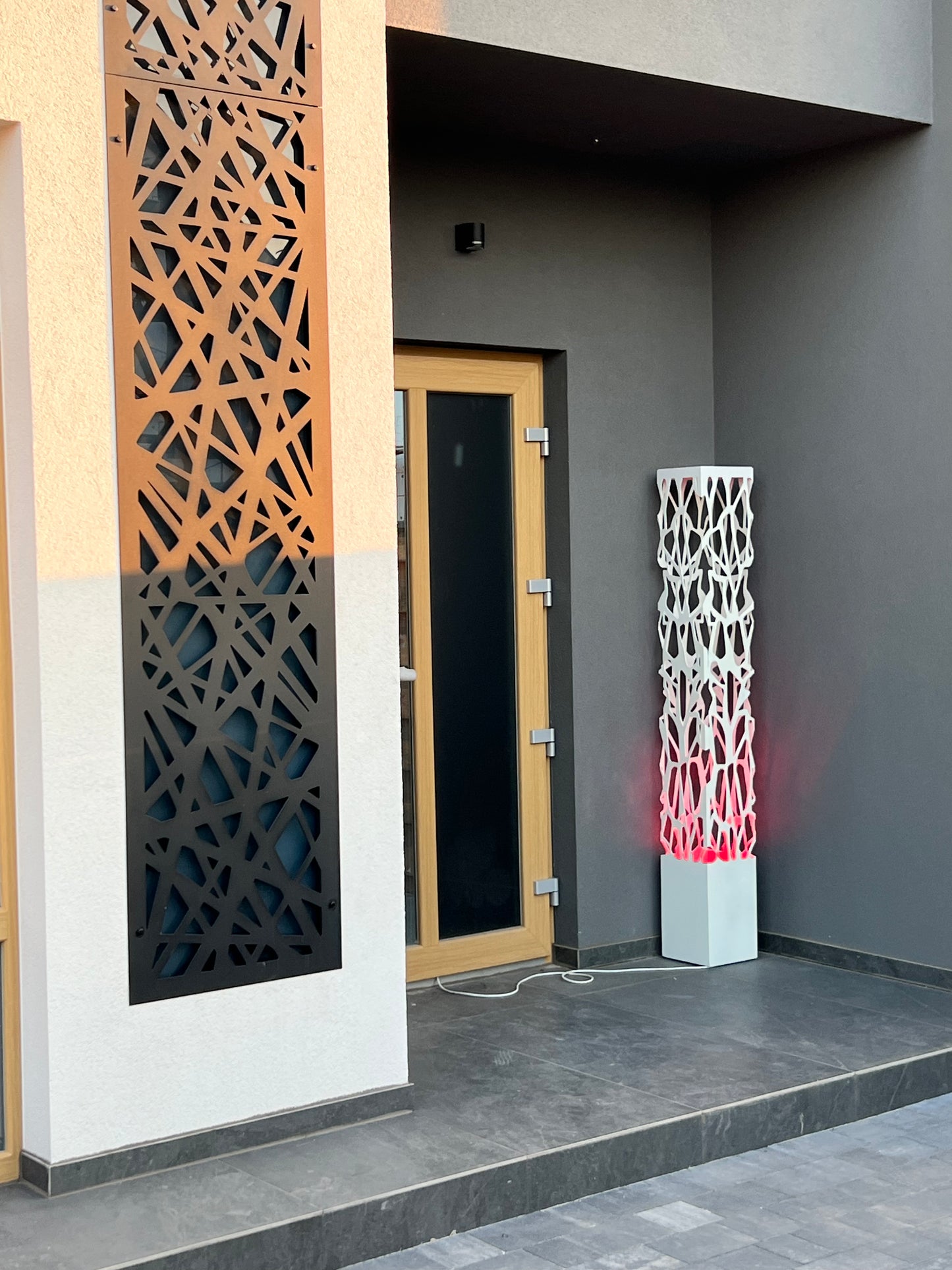 white metal garden column lamp with LED ambient lighting