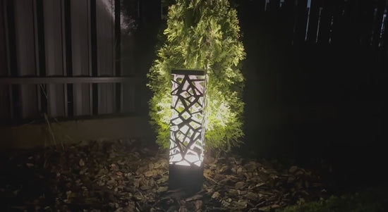 tall modern floor lamp with multicolor LED lighting in minimalist outdoor